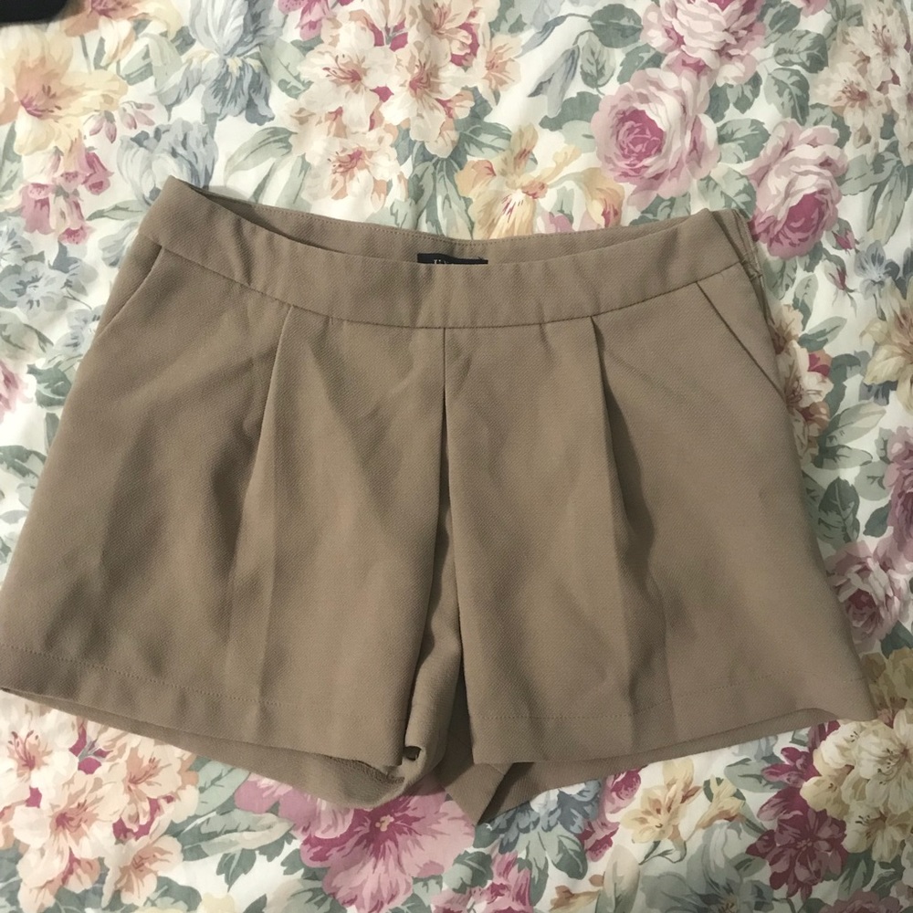 Tan pleated shorts